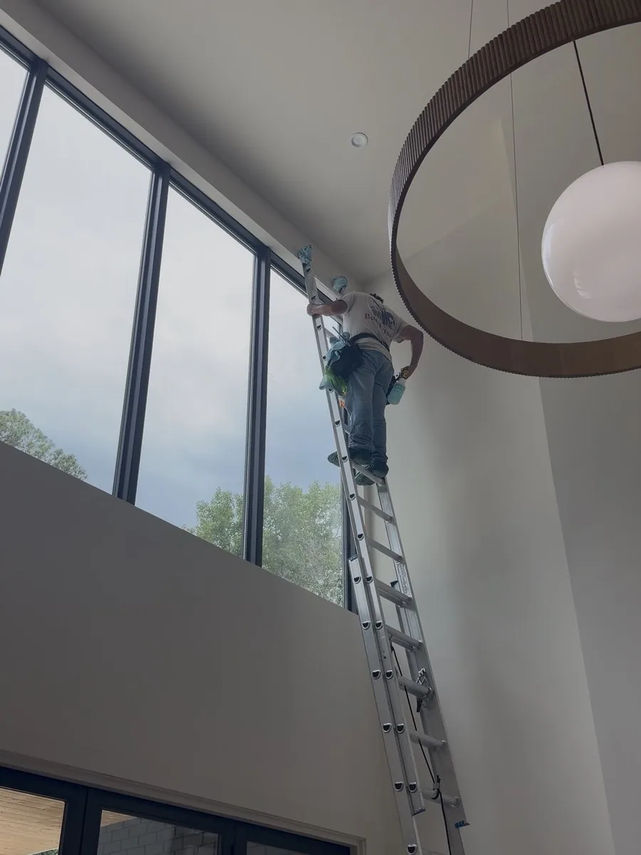 Window Cleaning project by Altura Cleaning in Atlanta Metro Area, GA. Interior high-window cleaning in a two-story great room.